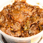 Natural Ambula Rai 500gm from Odisha, sun-dried mango pieces used to enhance the taste of dal, fish curry, and homemade recipes.